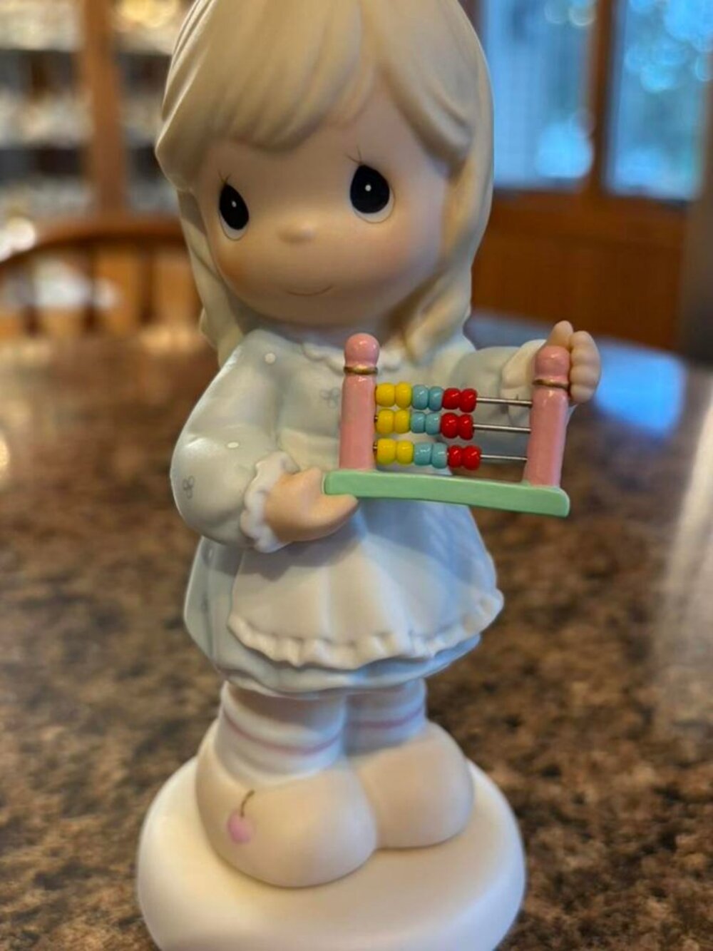 Girl with Abacus Ceramic Figurine